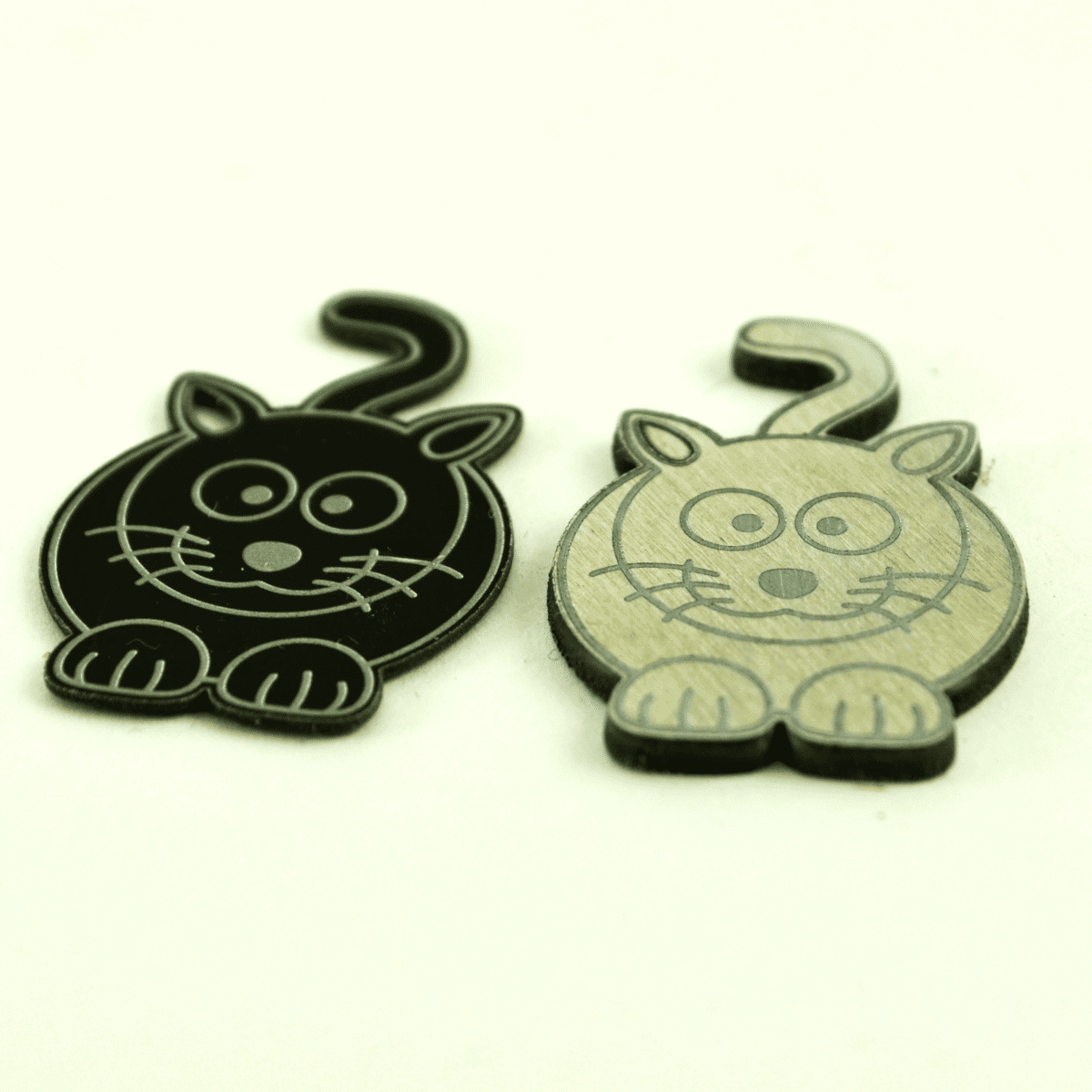 Laser Cut and Engraved Cat Pendants Laser Cut and Engraved Cat Pendants